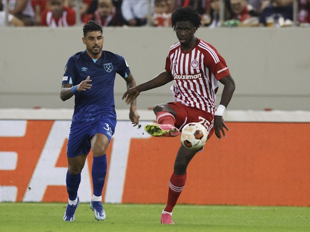 West Ham United's Emerson Palmieri in action with Olympiacos' Jackson Porozo on October 26, 2023