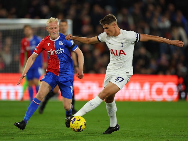 Tottenham Hotspur's Micky van de Ven in action with Crystal Palace's Will Hughes on October 27, 2023