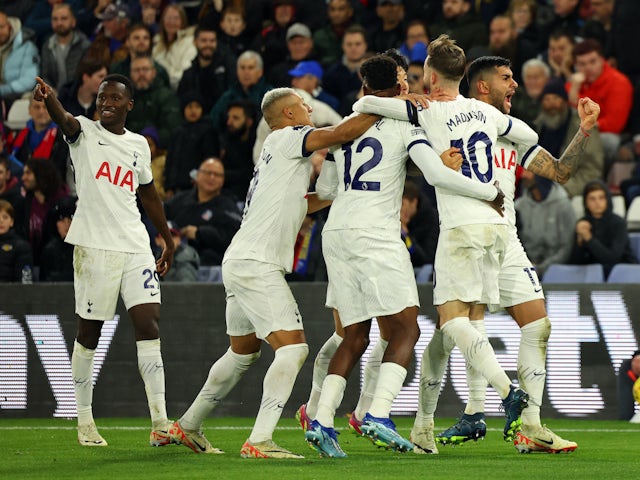 Tottenham Hotspur players celebrate an own goal from Crystal Palace's Joel Ward on October 27, 2023