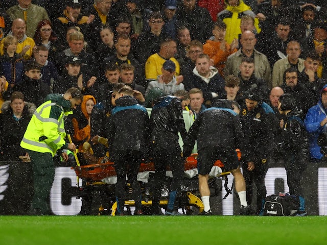 Wolverhampton Wanderers' Pedro Neto is stretchered off after sustaining an injury on October 28, 2023
