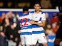 Queens Park Rangers' (QPR) Andre Dozzell celebrates scoring their first goal with Kenneth Paal on October 28, 2023
