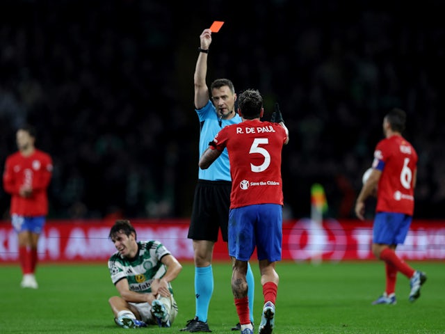 Atletico Madrid's Rodrigo De Paul is shown a red card by referee Felix Zwayer on October 25, 2023