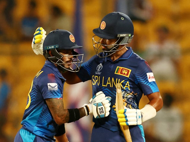 Sri Lanka celebrate on their way to victory over England at the Cricket World Cup on October 26, 2023.