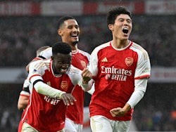 Arsenal's Takehiro Tomiyasu celebrates scoring their fifth goal on October 28, 2023