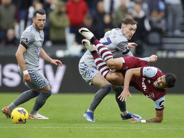 West Ham United's Lucas Paqueta in action with Everton's James Garner and Jack Harrison on October 29, 2023