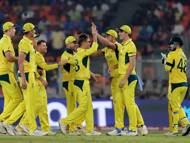 Australia celebrate taking a wicket against England in Cricket World Cup on November 4, 2023.