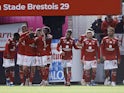Brest's Jeremy Le Douaron celebrates scoring their second goal with teammates on October 29, 2023