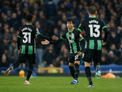 Brighton & Hove Albion's Kaoru Mitoma and Ansu Fati celebrate their first goal an own goal scored by Everton's Ashley Young on November 4, 2023