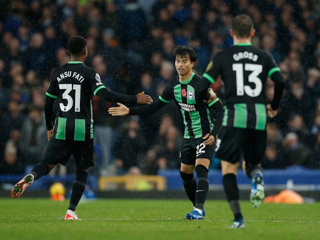 Brighton & Hove Albion's Kaoru Mitoma and Ansu Fati celebrate their first goal an own goal scored by Everton's Ashley Young on November 4, 2023