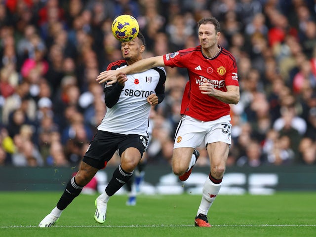 Fulham's Rodrigo Muniz in action with Manchester United's Jonny Evans on November 4, 2023
