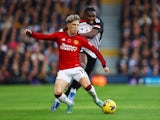 Fulham's Calvin Bassey in action with Manchester United's Alejandro Garnacho on November 4, 2023