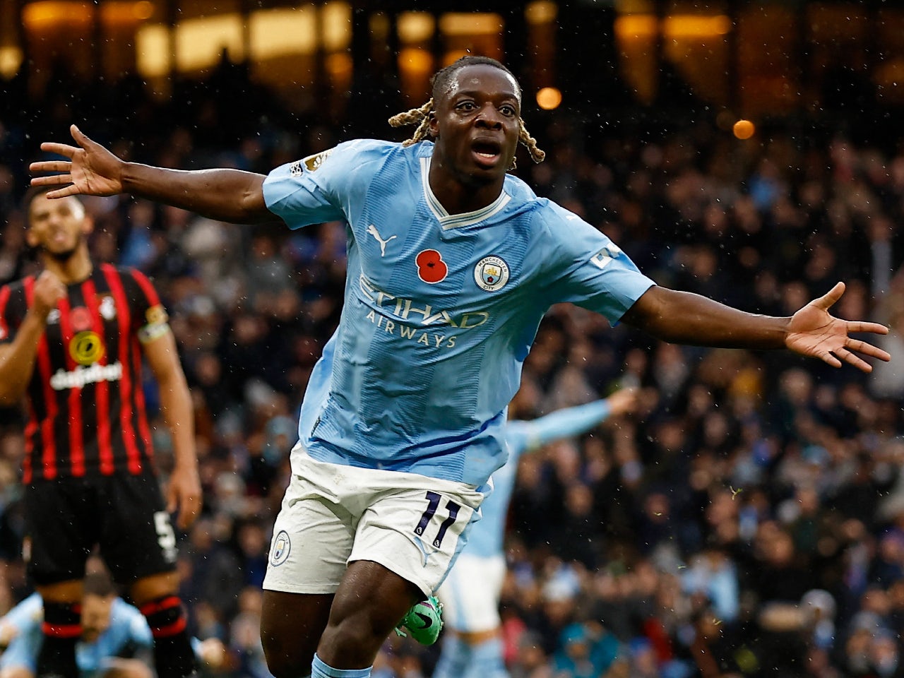 Jeremy Doku celebrates scoring for Manchester City in November 2023 ...