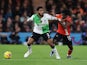 Liverpool's Joe Gomez in action with Luton Town's Issa Kabore on November 5, 2023