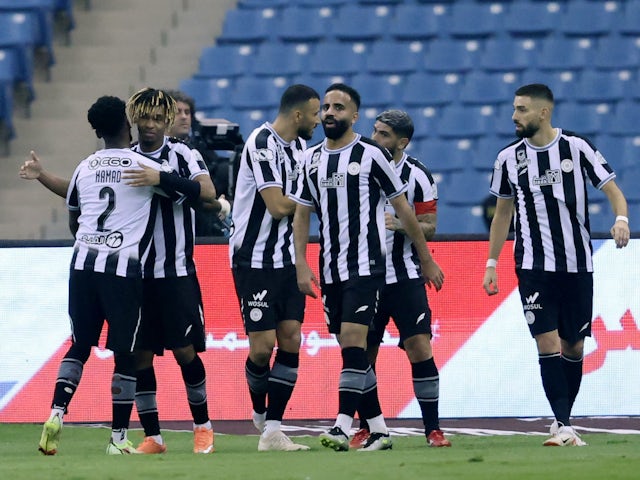 Al Shabab's Carlos celebrates scoring their first goal with teammates on November 3, 2023