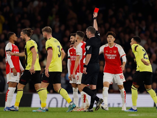 Arsenal's Fabio Vieira is shown a red card by referee Michael Oliver on November 11, 2023