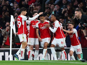 Ten-man Arsenal overcome Burnley to rise to second