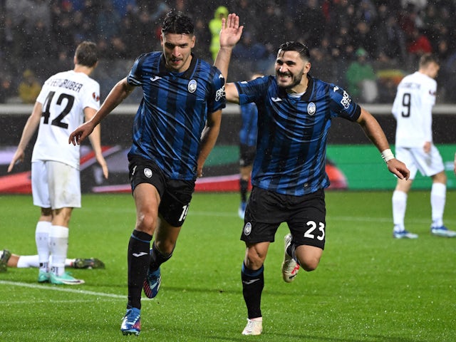 Atalanta's Berat Djimsiti celebrates scoring their first goal with Sead Kolasinac on November 9, 2023