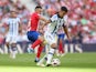 Atletico Madrid's Koke in action with Real Sociedad's Martin Zubimendi on October 8, 2023