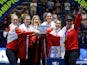Canada celebrate on the podium with the trophy after winning the Billie Jean King Cup on November 12, 2023