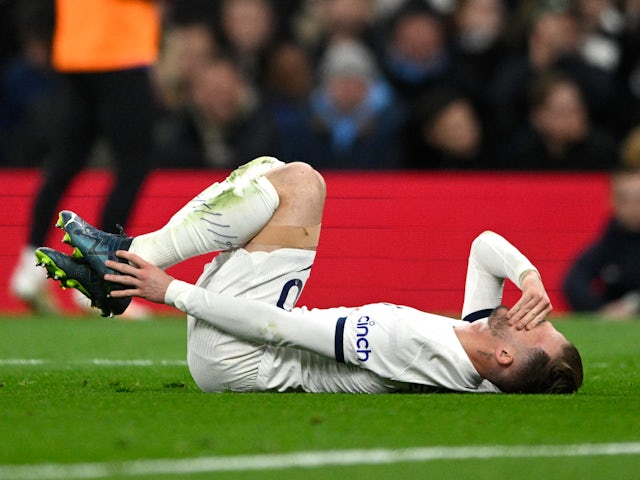 Tottenham Hotspur's James Maddison goes down injured on November 6, 2023