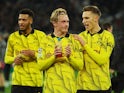 Borussia Dortmund's Julian Brandt and Nico Schlotterbeck celebrate after the match on November 7, 2023