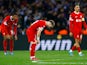 Liverpool players look dejected after Toulouse's Thijs Dallinga scores their second goal on November 9, 2023