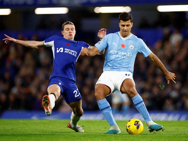 Chelsea's Conor Gallagher in action with Manchester City's Rodri on November 12, 2023