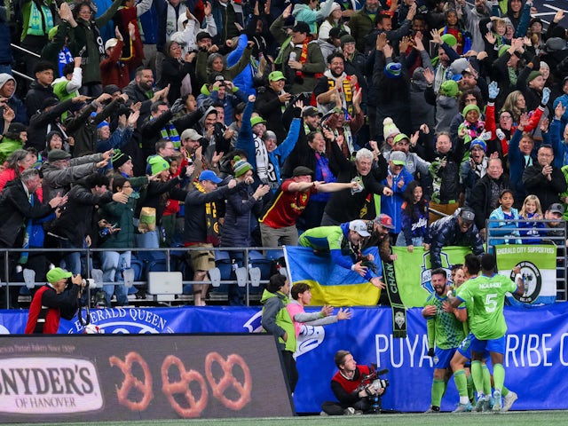 Seattle Sounders players and fans celebrate a goal scored by Seattle Sounders midfielder Albert Rusnak on November 11, 2023