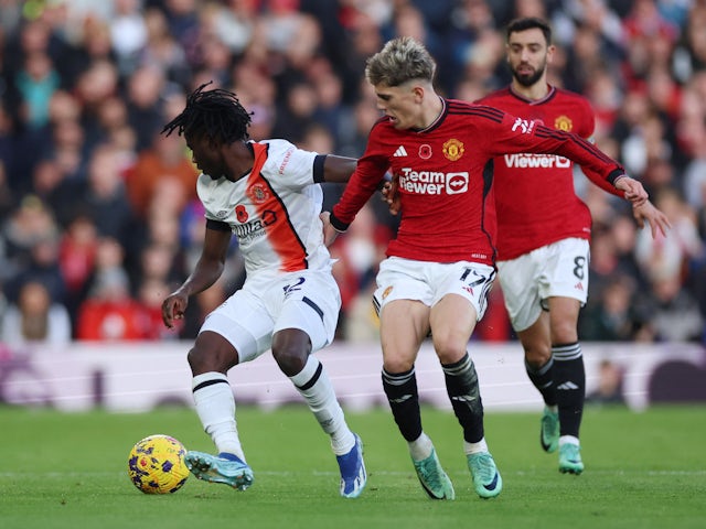 Luton Town's Issa Kabore in action with Manchester United's Alejandro Garnacho on November 11, 2023