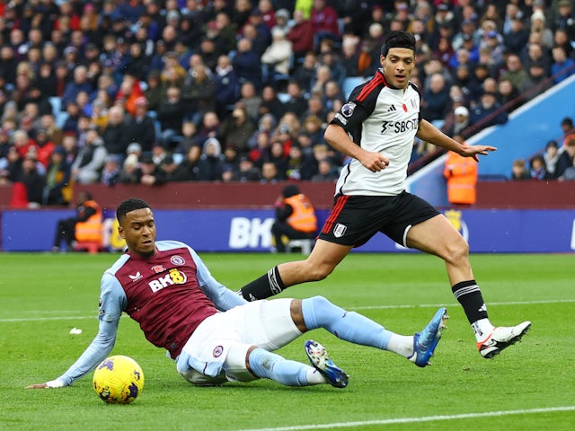 Aston Villa's Ezri Konsa in action with Fulham's Raul Jimenez on November 12, 2023