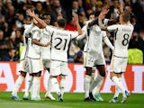 Real Madrid's Vinicius Junior celebrates scoring their second goal with teammates on November 8, 2023