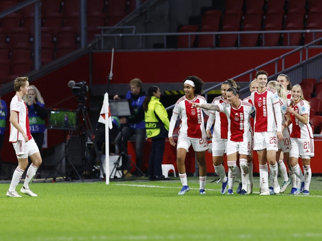 Ajax Women's Sherida Spitse celebrates scoring their second goal with teammates on November 15, 2023