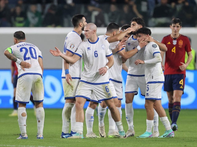 Cyprus' Kostas Pileas celebrates scoring their first goal with teammates on November 16, 2023