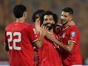 Egypt's Mohamed Salah celebrates scoring their fourth goal with teammates on November 16, 2023