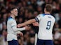 England's Phil Foden and Harry Kane celebrate their first goal an own goal scored by Malta's Enrico Pepe on November 17, 2023