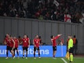 Georgia's Khvicha Kvaratskhelia celebrates scoring their second goal with teammates on November 16, 2023