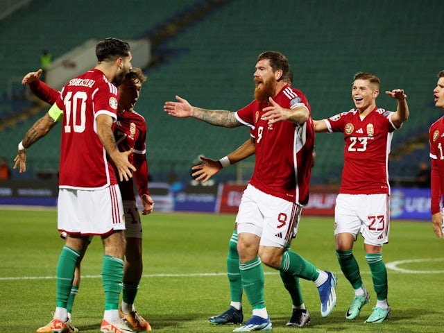 Hungary's Martin Adam celebrates scoring their first goal with teammates on November 16, 2023