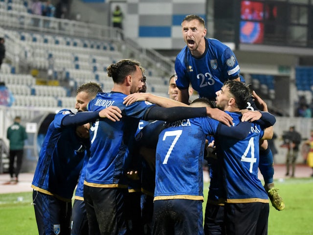 Kosovo's Milot Rashica celebrates scoring their first goal with teammates on November 12, 2023