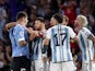 Argentina's Lionel Messi clashes with Uruguay's Mathias Olivera on November 16, 2023
