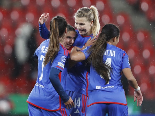 Lyon Women's Amel Majri celebrates scoring their eighth goal with Danielle van de Donk, Selma Bacha and Ada Hegerberg on November 14, 2023