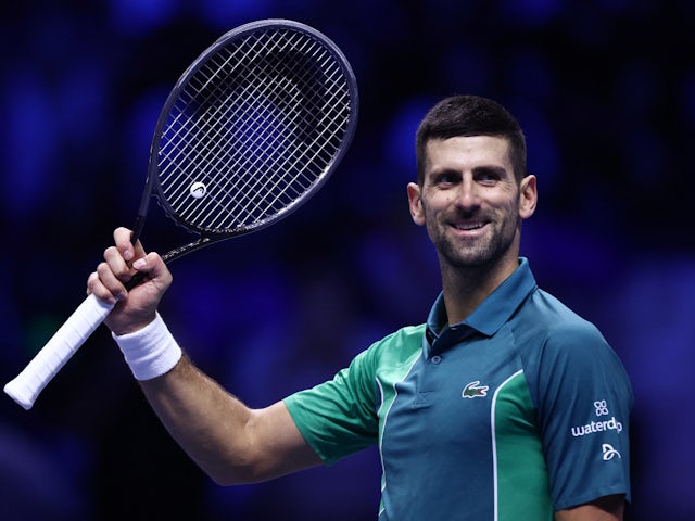 Novak Djokovic celebrates after winning his group stage match against Denmark's Holger Rune on November 12, 2023