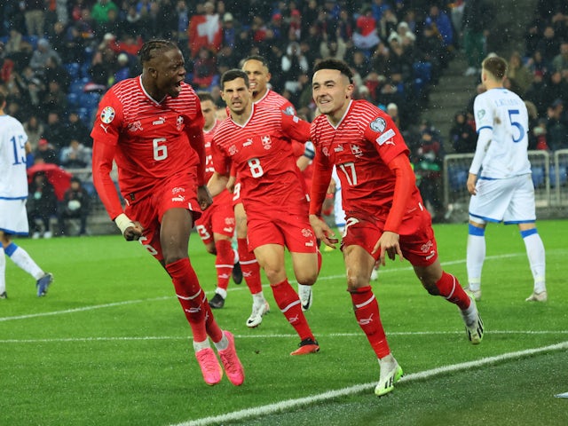 Switzerland's Ruben Vargas celebrates scoring their first goal with teammates on November 18, 2023