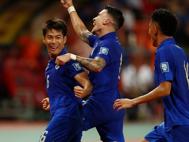 Thailand's Sarach Yooyen celebrates scoring their first goal with Tristan Do on November 16, 2023