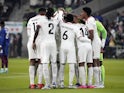 Trinidad and Tobago players huddle before the match on November 17, 2023