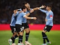 Uruguay's Ronald Araujo celebrates scoring their first goal with teammates on November 17, 2023