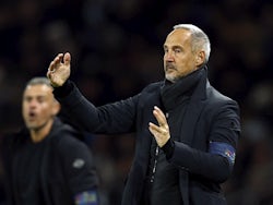 Monaco coach Adi Hutter reacts as Paris St Germain coach Luis Enrique looks on on November 24, 2023