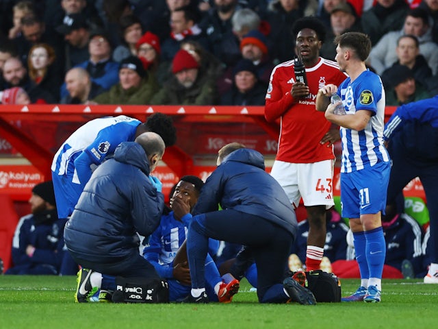 Brighton & Hove Albion's Ansu Fati receives medical attention after sustaining an injury on November 25, 2023
