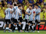 Argentina's Nicolas Otamendi celebrates scoring their first goal with teammates on November 22, 2023