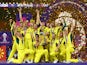 Australia players celebrate with the trophy after winning the ICC Cricket World Cup on November 19, 2023