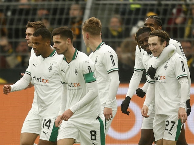 Borussia Monchengladbach's Rocco Reitz celebrates scoring their first goal with Manu Kone on November 25, 2023